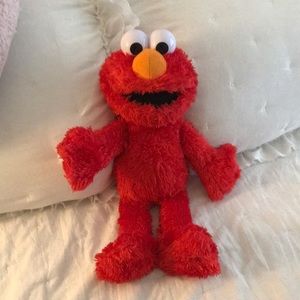 Tickle me Elmo doll working cond. 15 inches tall